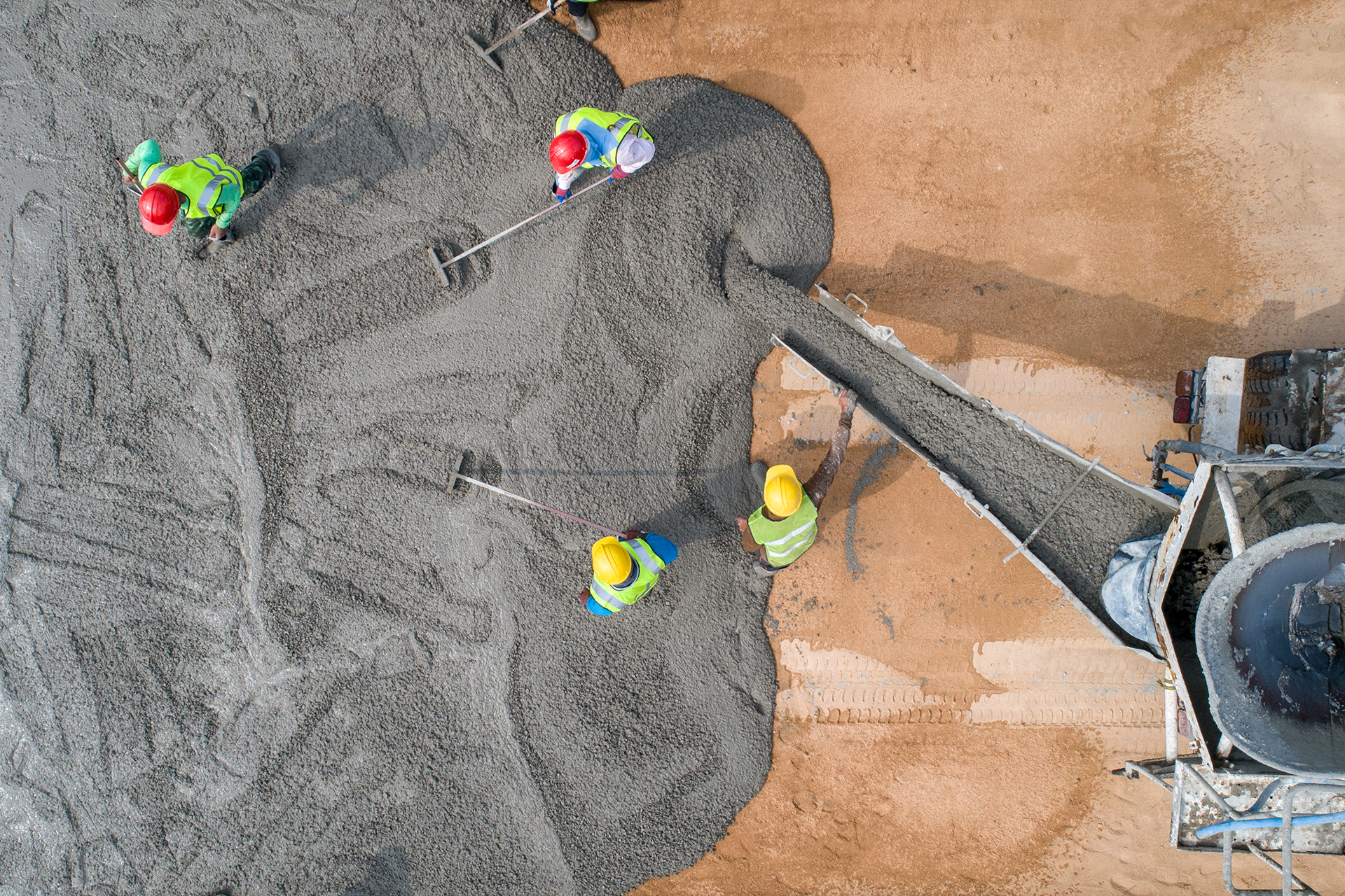 construction-worker-pouring-wet-concret-road-construction-site