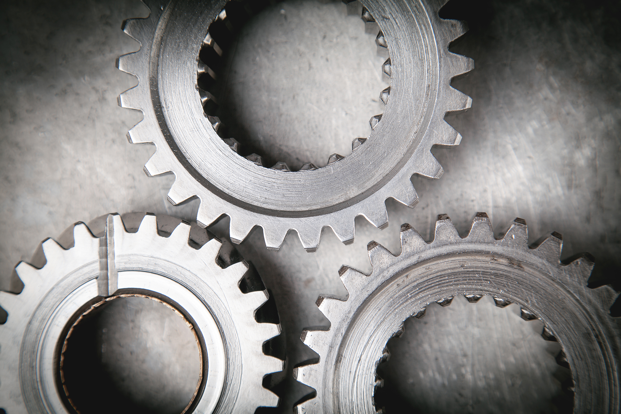 Gears mechanism on metal background. Industry